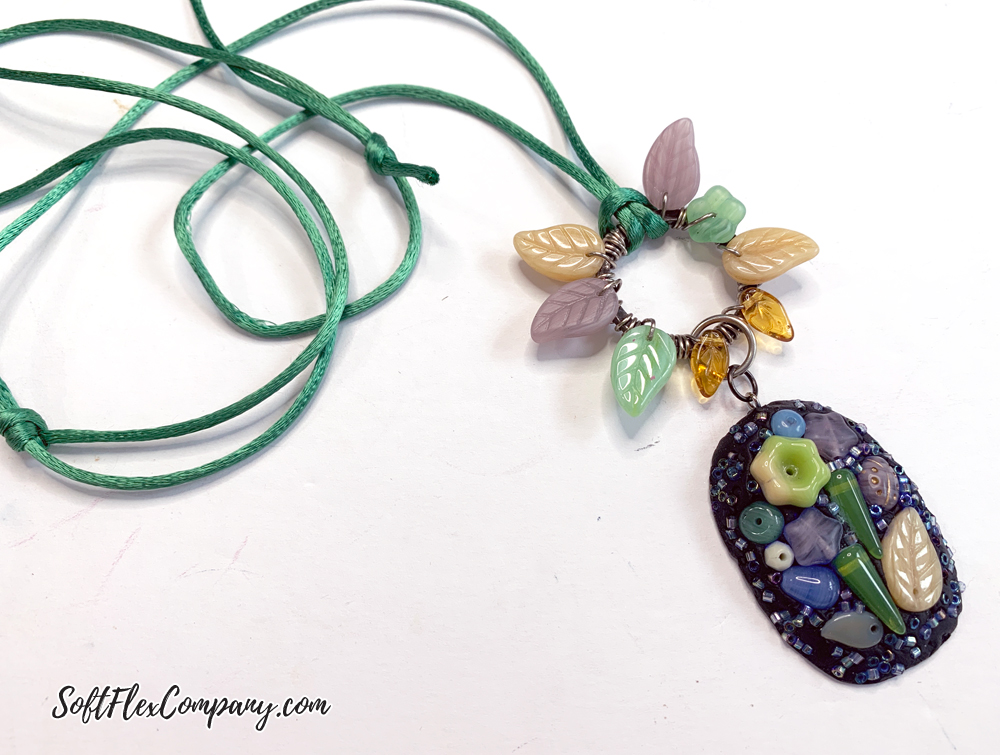 Sliding Knot Necklace With Czech Glass Flower Garden Pendant And Wire Wrapped Leaves by Kristen Fagan