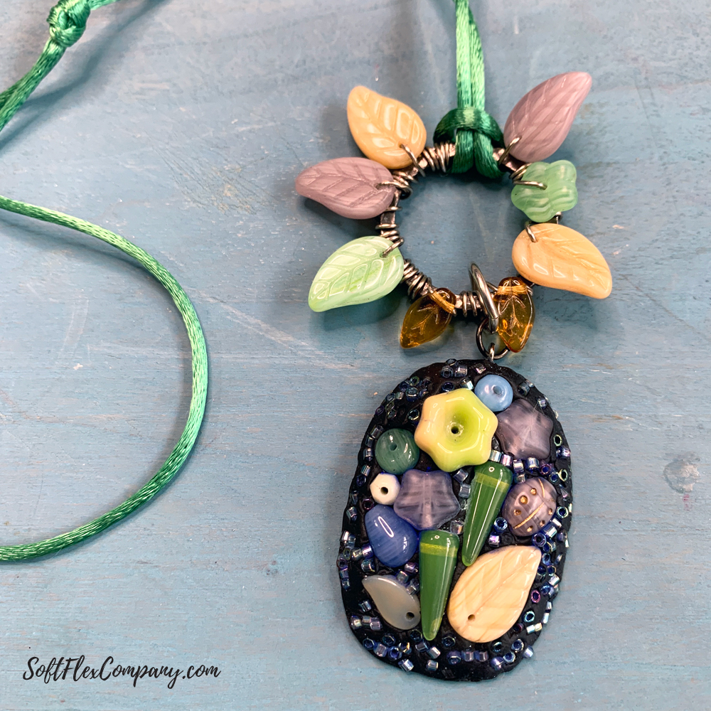 Sliding Knot Necklace With Czech Glass Flower Garden Pendant And Wire Wrapped Leaves by Kristen Fagan