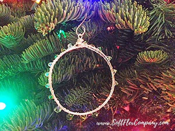 Beaded Wire Wreath Ornament On Tree