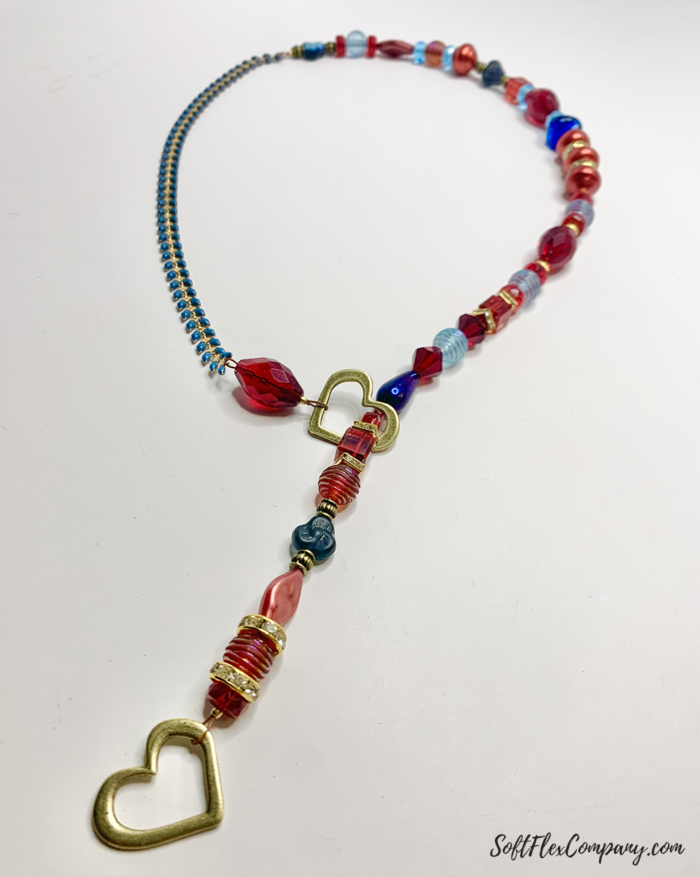 Lariat Necklace With Pantone Colors And A Heart Pendant by Sara Oehler