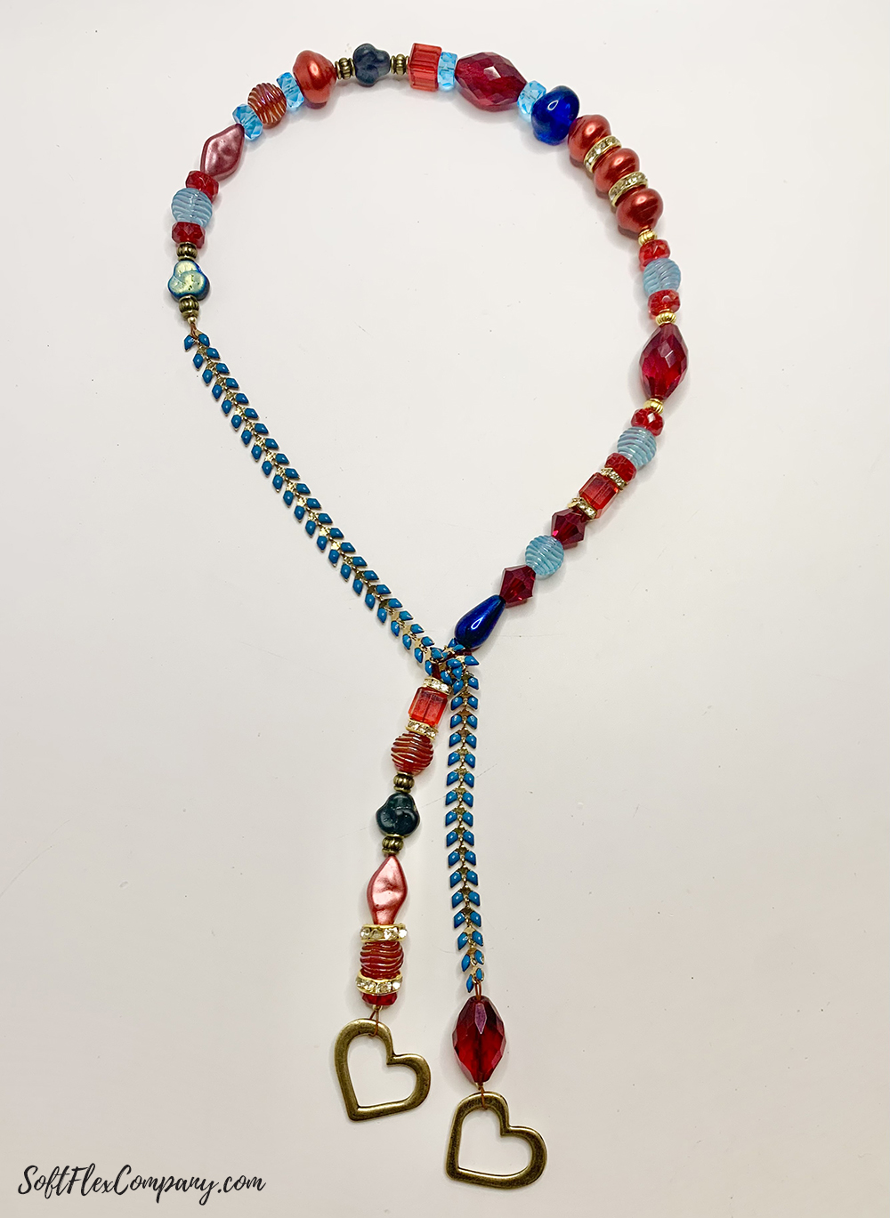 Lariat Necklace With Pantone Colors And A Heart Pendant by Sara Oehler