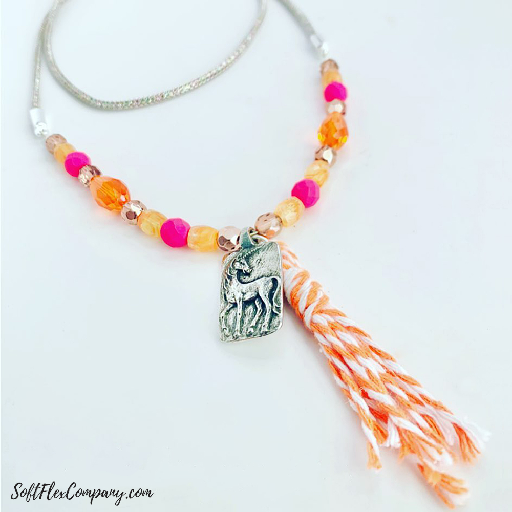 Peace And Love Unicorn Tassel Necklace by Sara Oehler